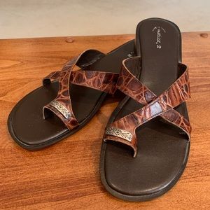 Brown leather slip on criss cross low heel sandal